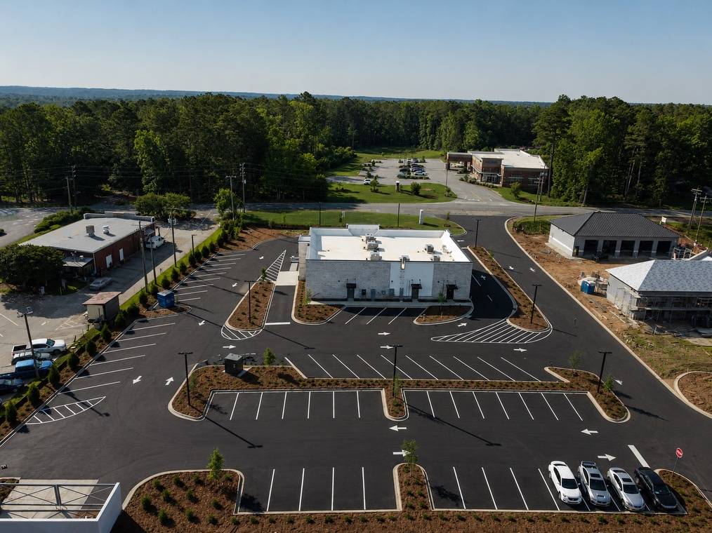 aerial view of building and parking lot